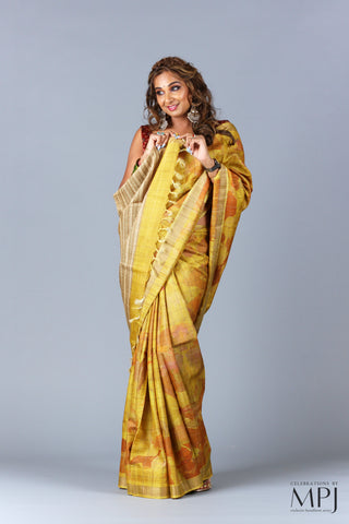 Turmeric Yellow Floral Tusser Silk Saree with Stitched Blouse