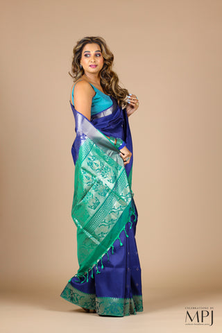 Indigo Blue Soft Silk Saree with Peacock Green Brocade Border with Stitched Blouse